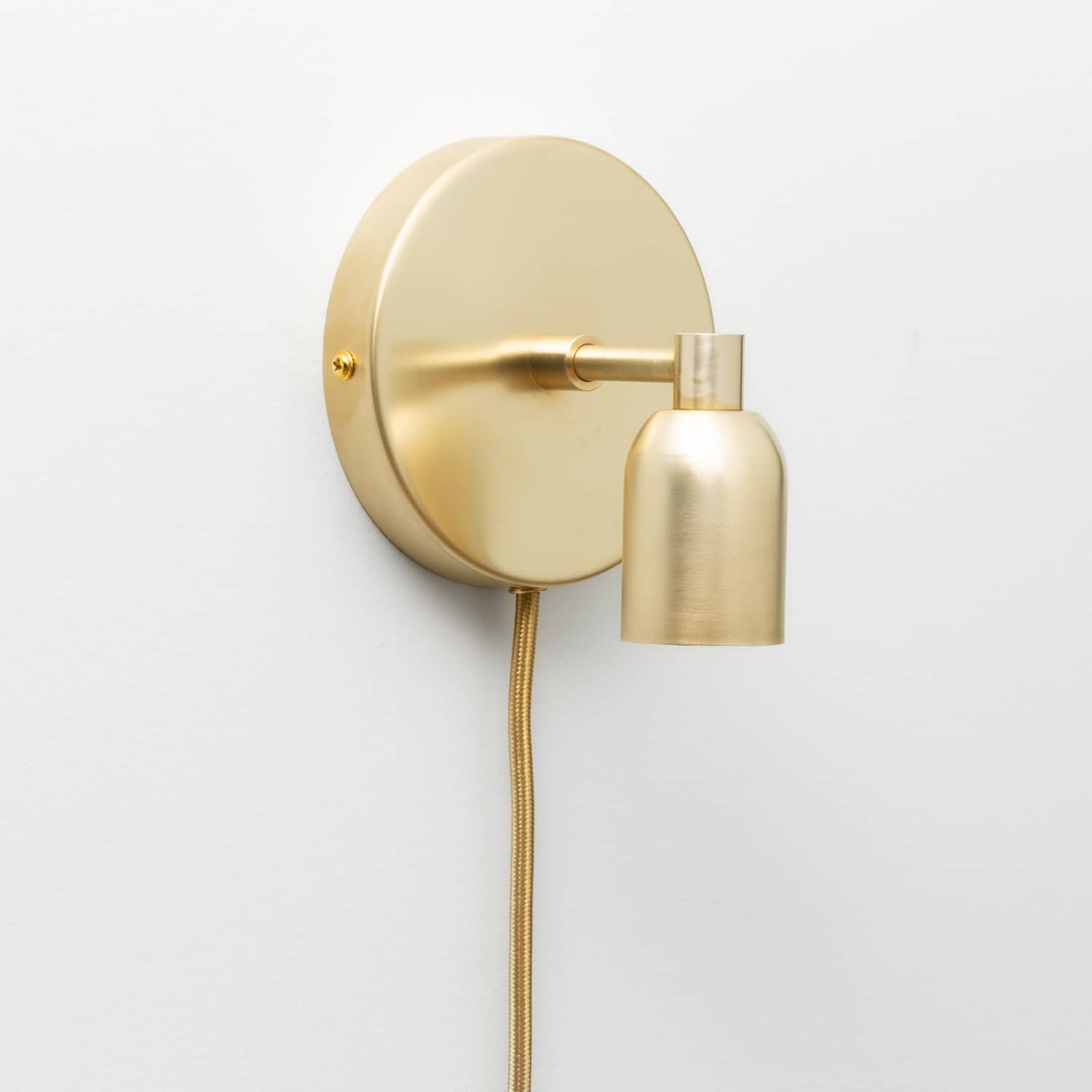 Junction Mini Solo Plug-In Sconce in Raw Brass finish 