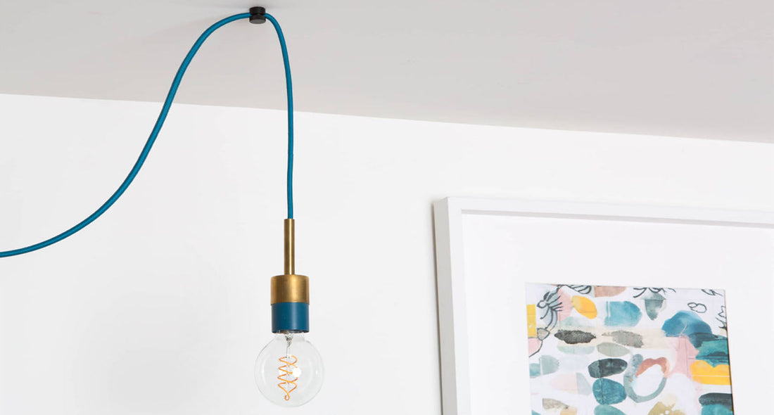 swag light pendant light fixture in a living room