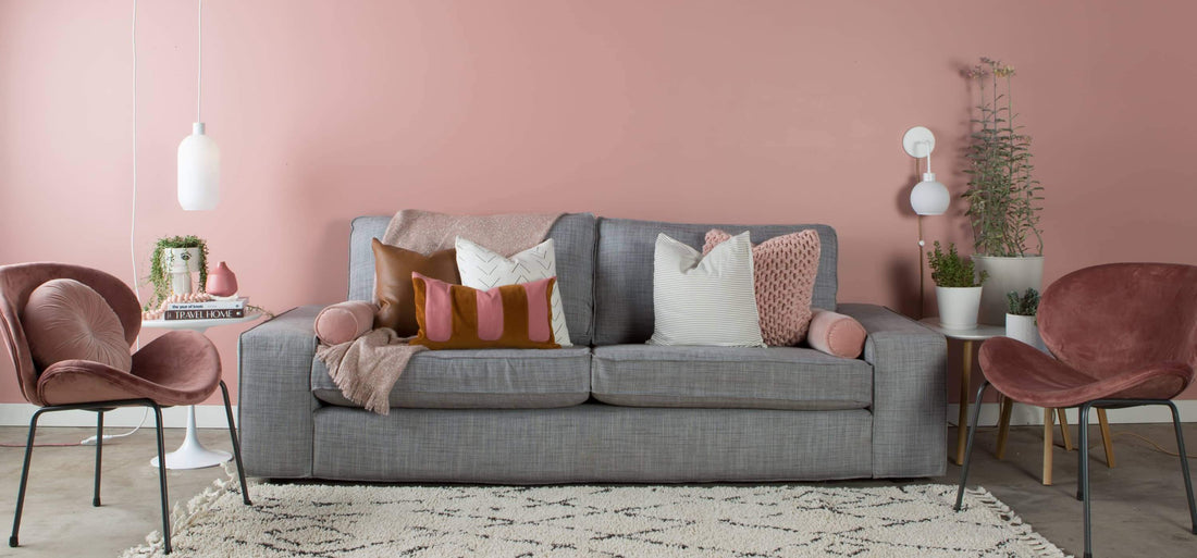 AiO pendant with pink and rust living room setting