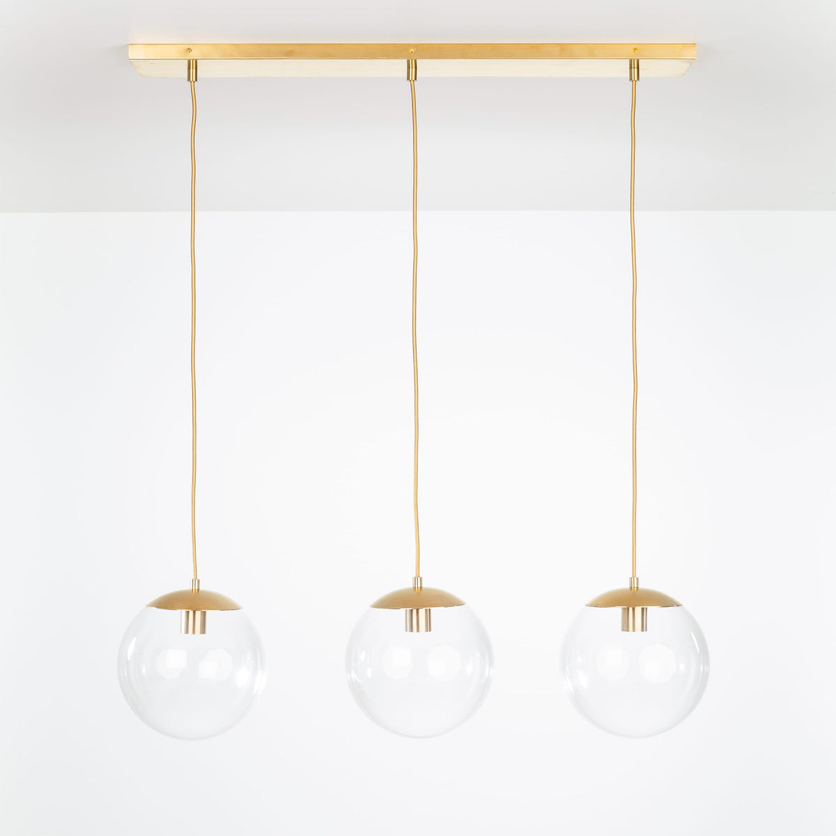 Mod Globe 3-Line Chandelier Brass / 10in Clear