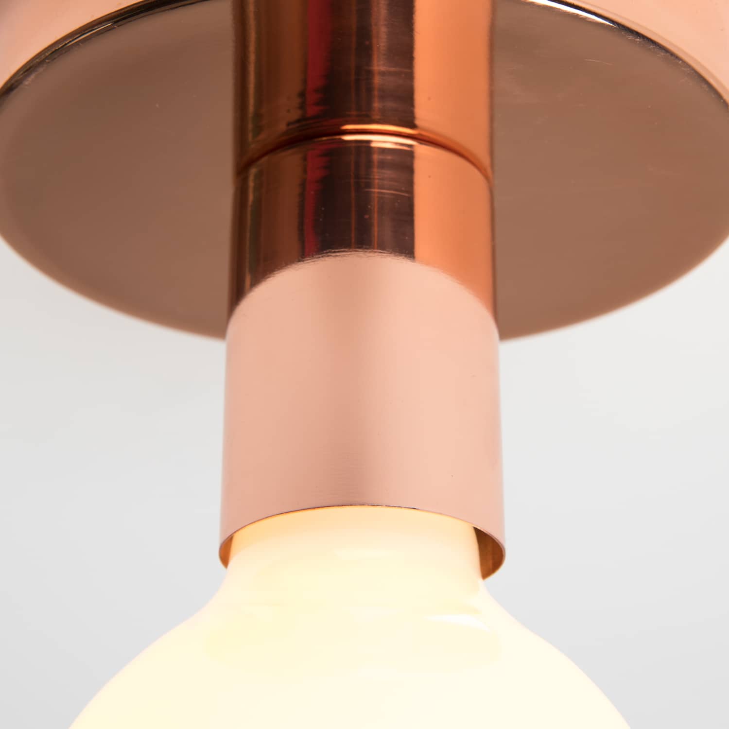 Close up Button Light in Polished Copper finish
