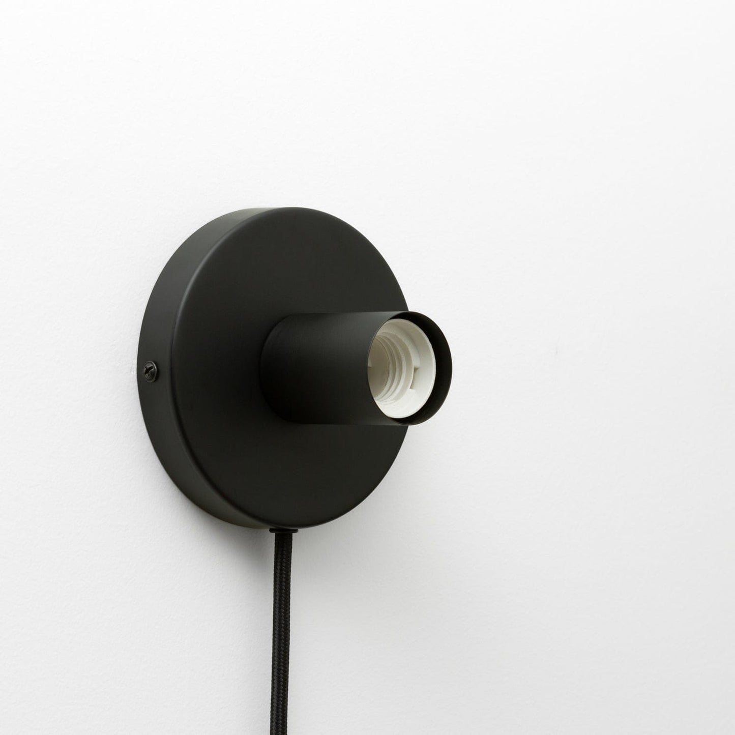 Button Plug-In Sconce in Matte Black finish
