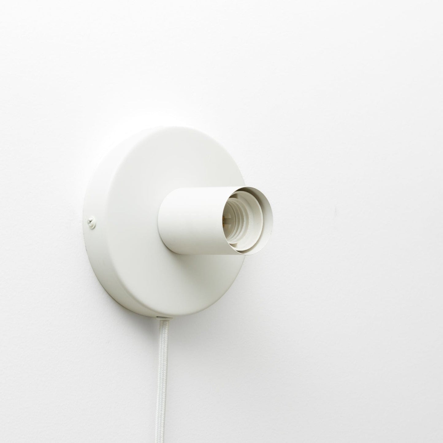 Button Plug-In Sconce in Matte White finish