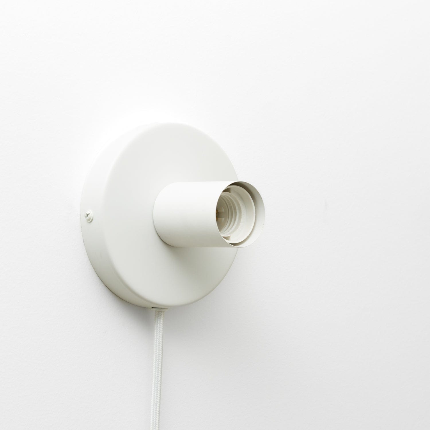 Button Plug-In Sconce in Matte White finish