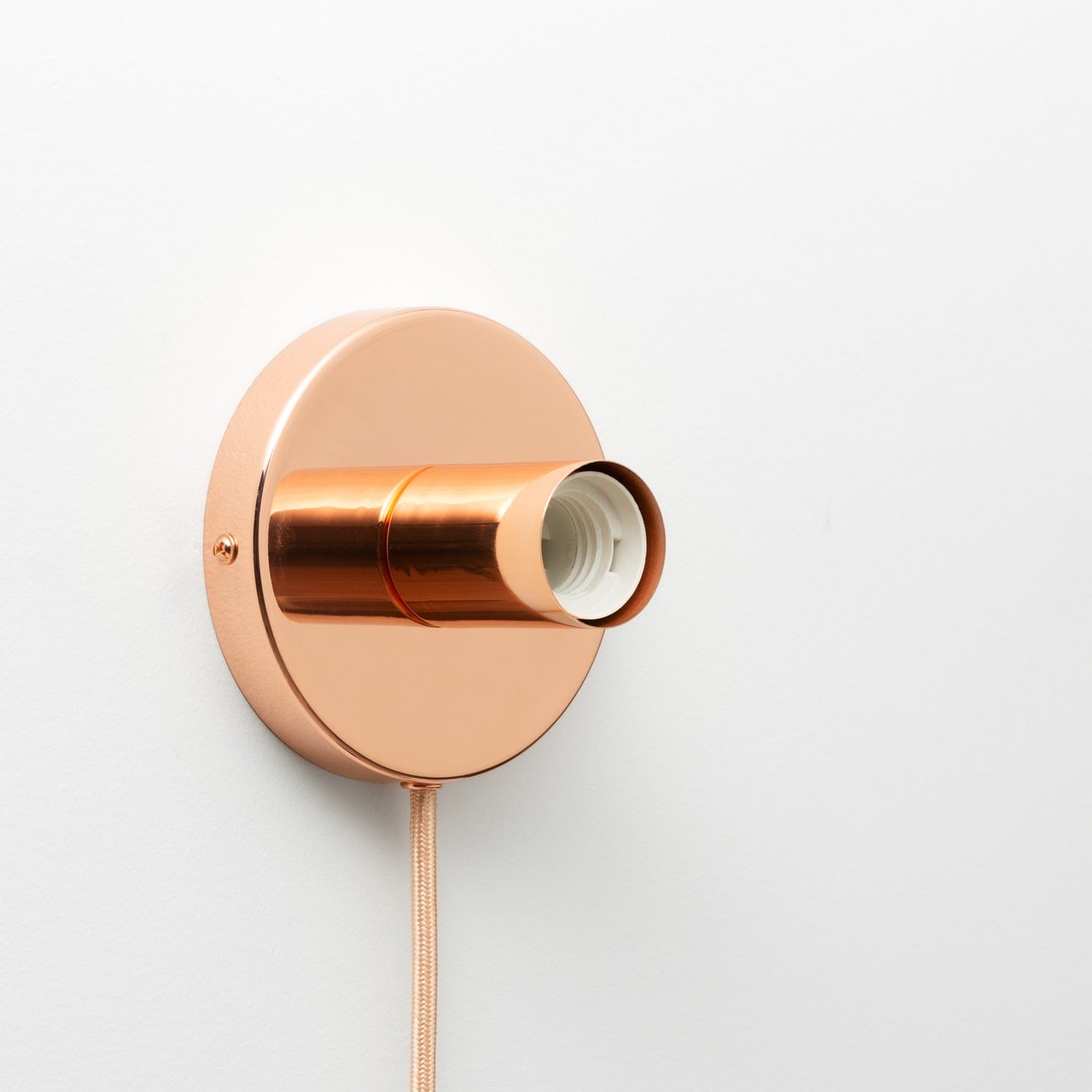 Button Plug-In Sconce in Polished Copper finish