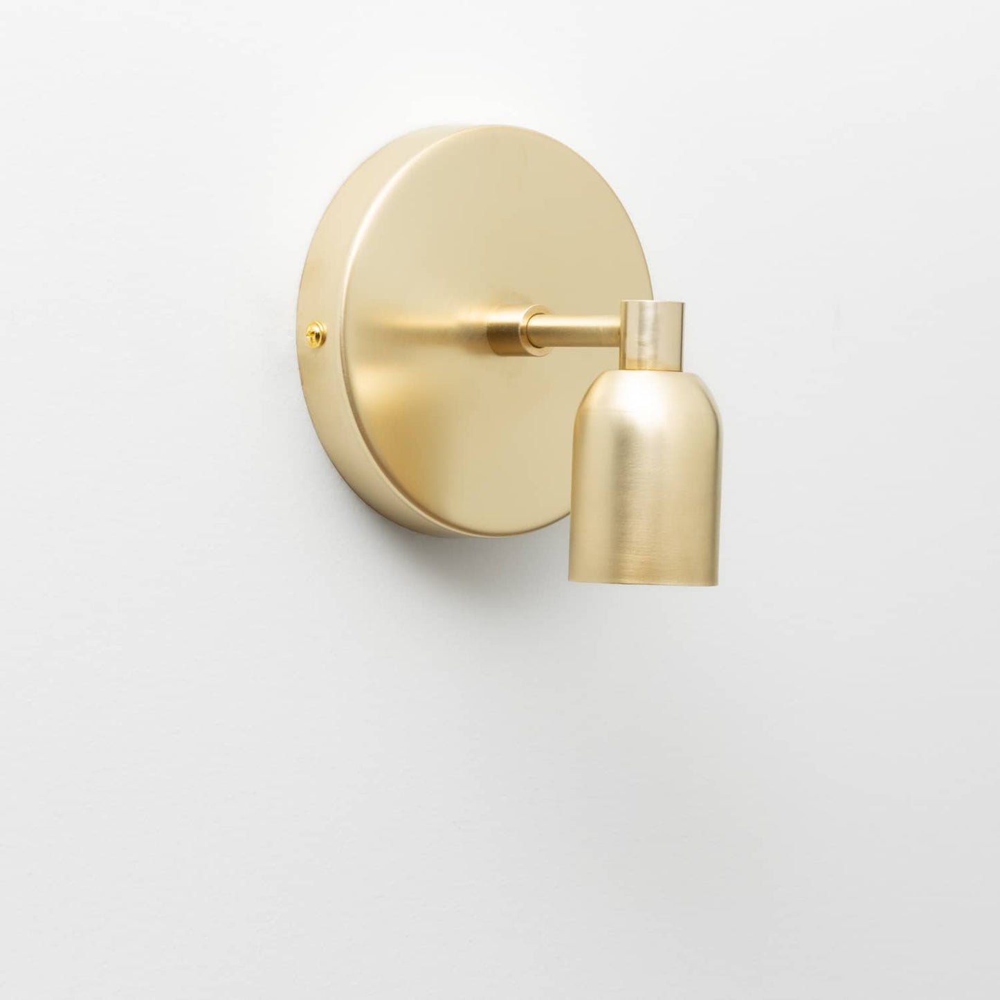 Junction Mini Solo Sconce in Raw Brass finish 