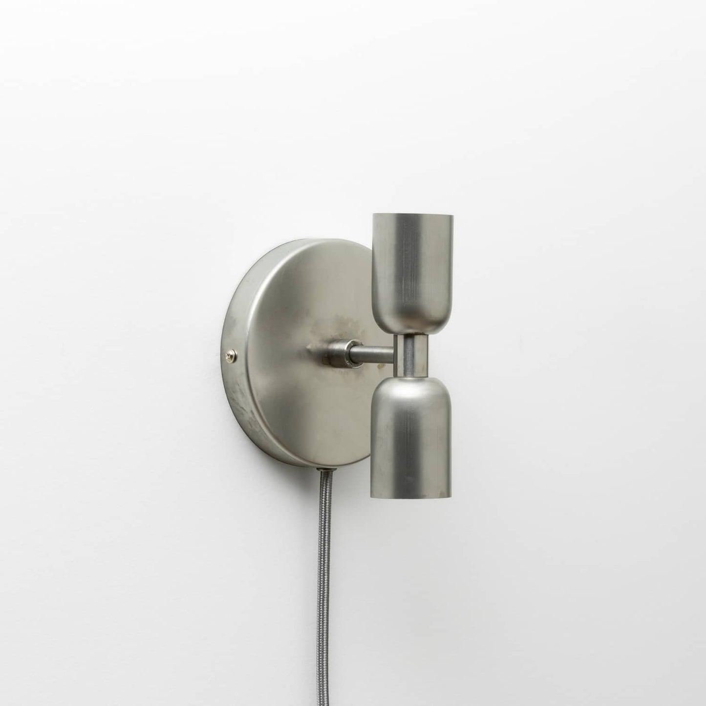 Junction Mini Duo Plug-In Sconce in Raw Metal finish 