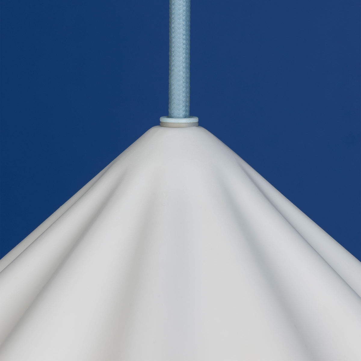 Fleur No. 7 porcelain pendant light with Shale cord and hardware, fluted raw porcelain shade
