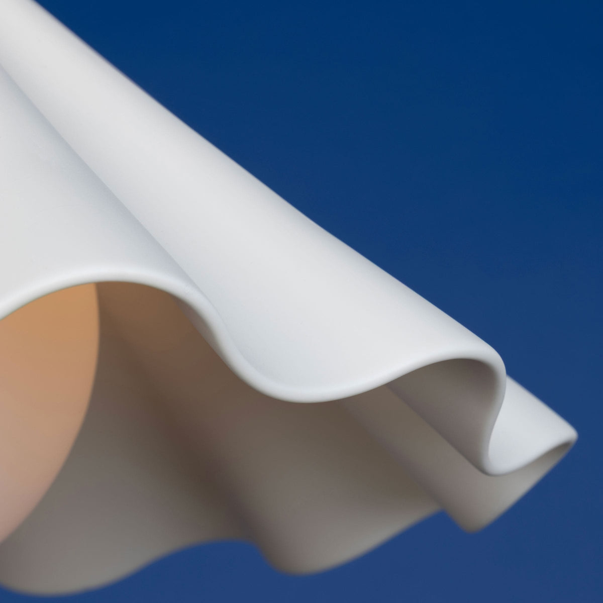 Fleur No. 7 porcelain pendant light with Shale cord and hardware, fluted raw porcelain shade