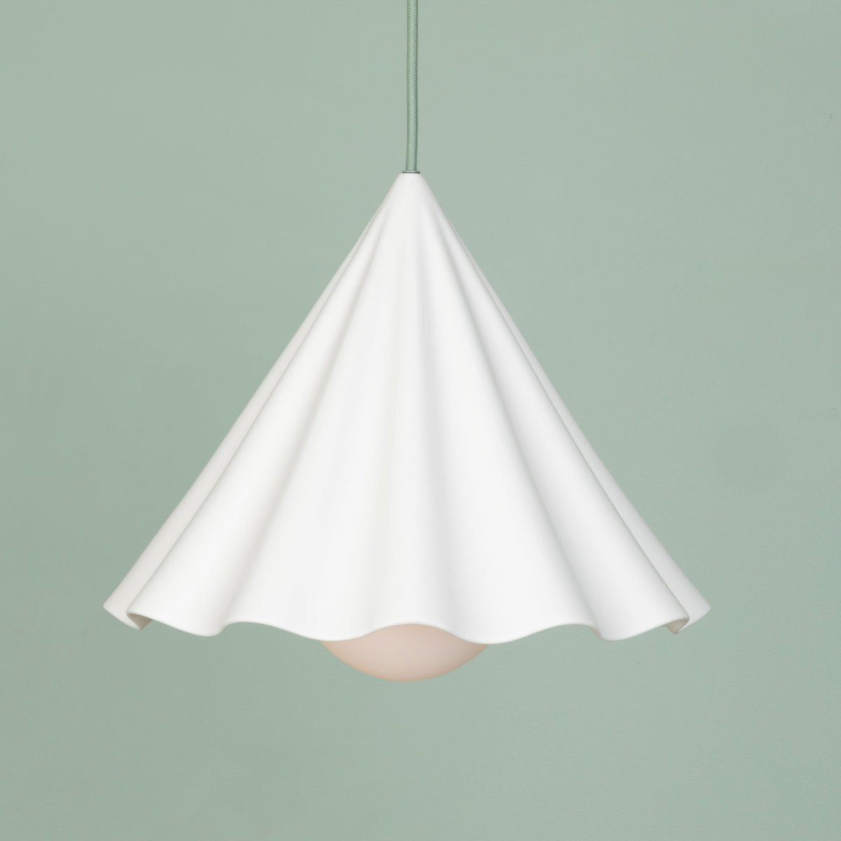 Fleur No. 12 porcelain pendant light with Sage cord and hardware, fluted raw porcelain shade