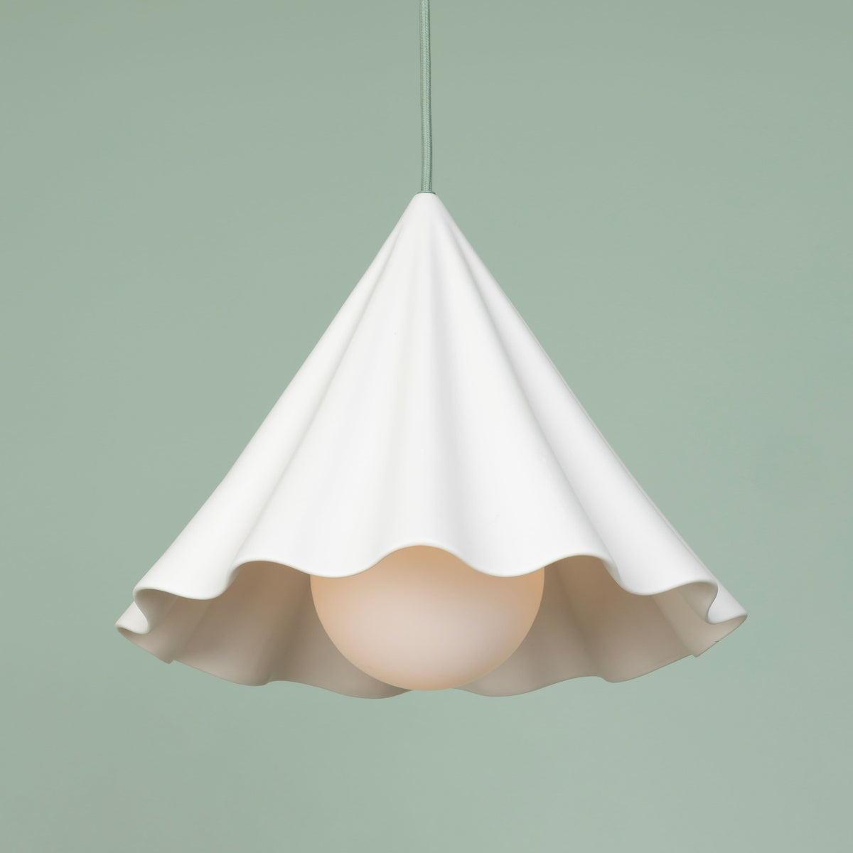 Fleur No. 12 porcelain pendant light with Sage cord and hardware, fluted raw porcelain shade