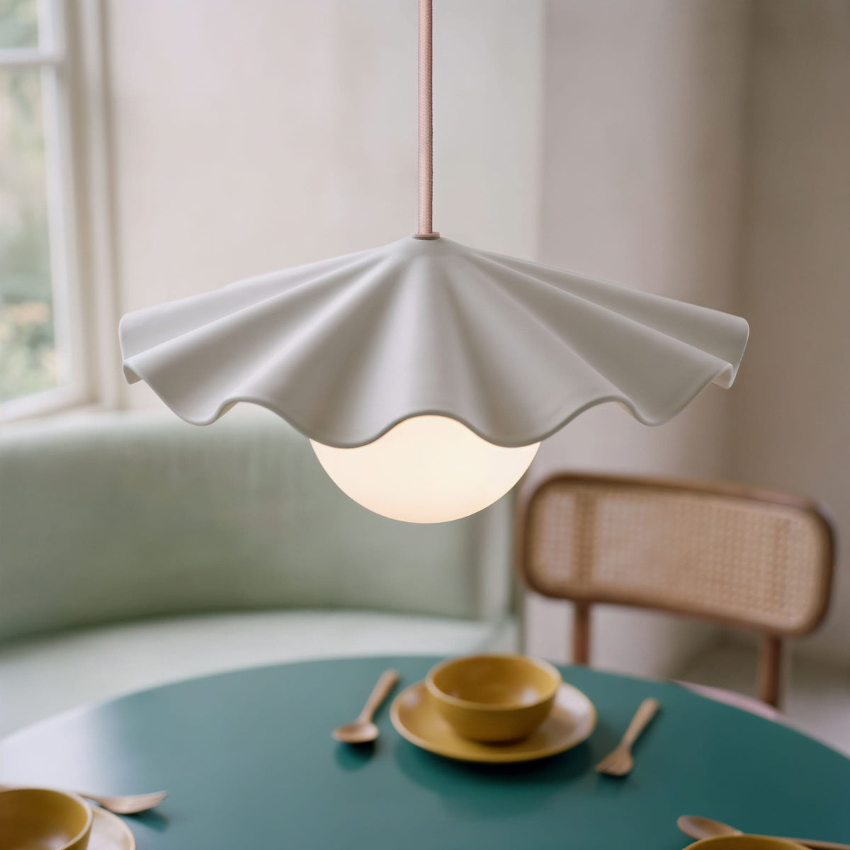 Fleur No. 3 porcelain pendant light with Quartz cord and hardware in a home setting