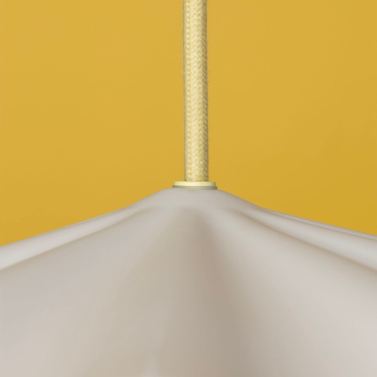 Fleur No. 3 plug-in porcelain pendant light with Pale Yellow cord and hardware, fluted raw porcelain shade
