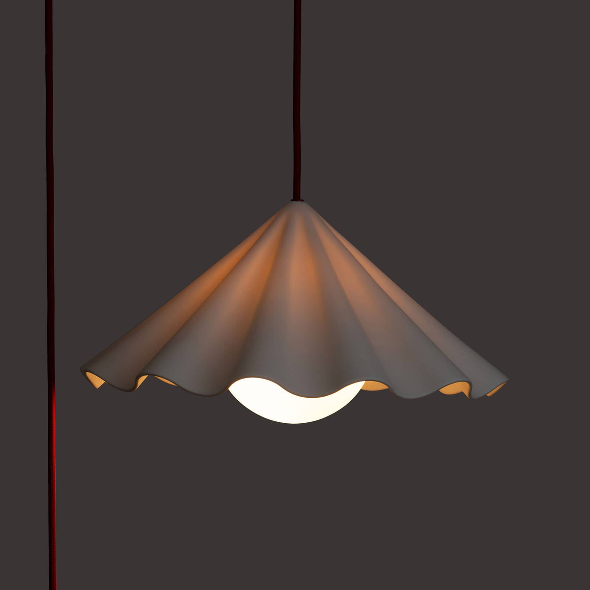 Fleur No. 7 plug-in porcelain pendant light, raw porcelain shade with Cardinal cord and hardware