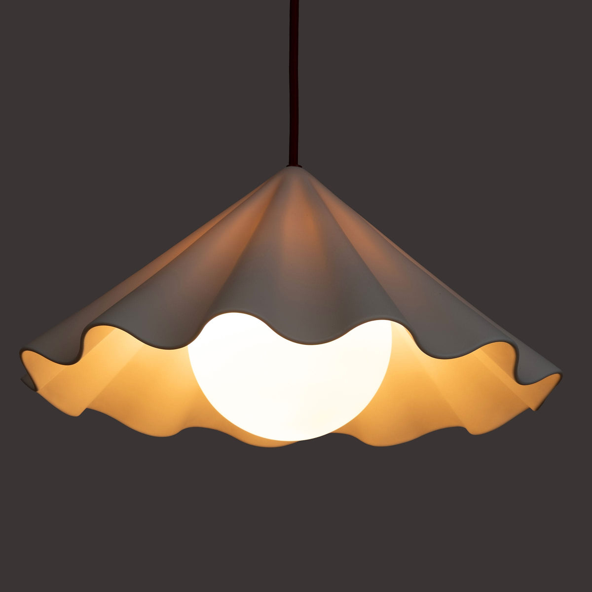 Fleur No. 7 plug-in porcelain pendant light, raw porcelain shade with Cardinal cord and hardware