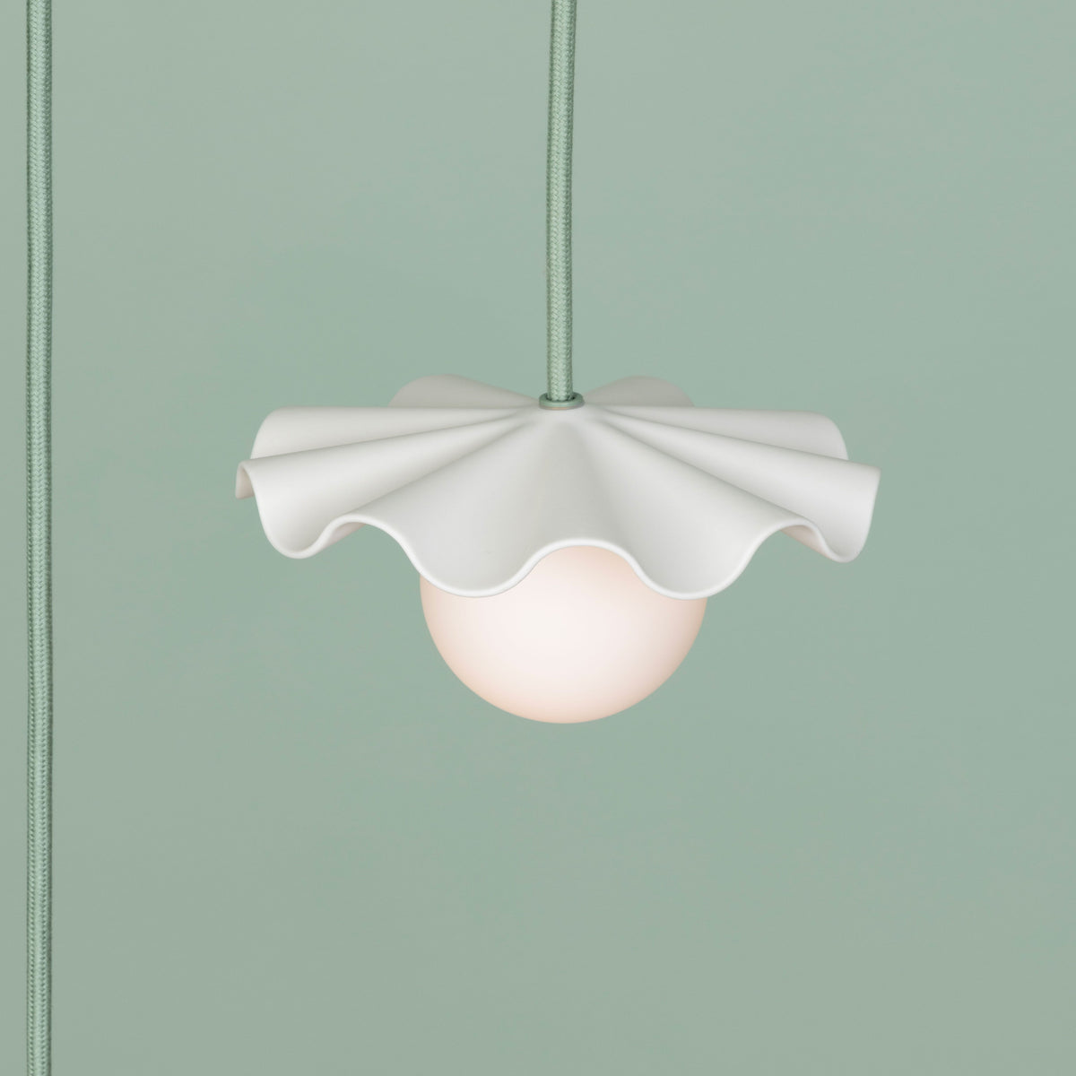Fleur No. 1 plug-in porcelain mini pendant light with Sage cord and hardware, fluted raw porcelain shade