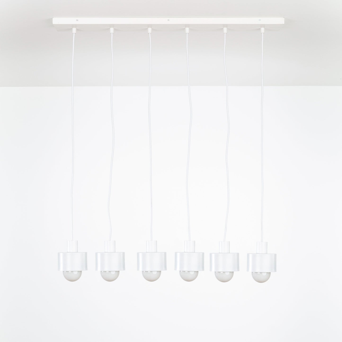 All in One 6-Line Puck Chandelier